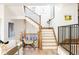 Elegant wooden staircase with black metal railings at 1275 S Elizabeth St, Denver, CO 80210