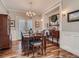 Elegant dining room with hardwood floors, a chandelier, and a well-appointed buffet at 930 Kearney St, Denver, CO 80220