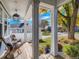 Inviting front porch with comfortable seating and views of the landscaped front yard at 930 Kearney St, Denver, CO 80220