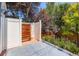 Enclosed hot tub area provides privacy and relaxation surrounded by lush greenery and a wooden privacy screen at 930 Kearney St, Denver, CO 80220