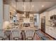 Modern kitchen with stainless steel appliances, granite countertops, and a breakfast bar at 930 Kearney St, Denver, CO 80220