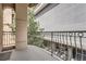 View from balcony overlooking metal railing and exterior building at 1200 Cherokee St # 206, Denver, CO 80204