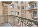 Balcony view showcasing the building's architecture and an outdoor patio at 1200 Cherokee St # 206, Denver, CO 80204