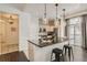 Modern kitchen with a large island, granite countertops, and stainless steel appliances at 1200 Cherokee St # 206, Denver, CO 80204