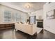 Bright living room with fireplace, large windows, and hardwood floors at 1200 Cherokee St # 206, Denver, CO 80204