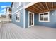 Spacious back deck with sliding glass doors and ample space for outdoor entertaining and relaxation at 2165 Peralta Loop, Castle Rock, CO 80104