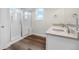 Bathroom features a glass shower, double sink vanity and modern fixtures at 2165 Peralta Loop, Castle Rock, CO 80104