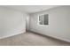 Bright bedroom with carpeted floors, white walls, and a window at 2165 Peralta Loop, Castle Rock, CO 80104