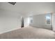 Large bonus room features neutral carpet and great natural light at 2165 Peralta Loop, Castle Rock, CO 80104