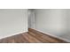 Hallway with wood look vinyl flooring and white doors at 2165 Peralta Loop, Castle Rock, CO 80104