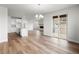 Open floor plan featuring kitchen, dining area, living room, and outdoor access at 2165 Peralta Loop, Castle Rock, CO 80104