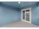 Enclosed outdoor deck with sliding glass door, perfect for enjoying the outdoors in comfort at 2165 Peralta Loop, Castle Rock, CO 80104