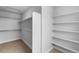 Spacious walk-in closet offering ample shelving and storage space at 2165 Peralta Loop, Castle Rock, CO 80104