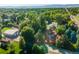 Wide shot of property, showing home, outbuildings, and landscape at 10250 W 80Th Ave, Arvada, CO 80005