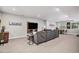 Spacious living room with a modern TV and comfortable seating area at 3091 Keepsake Way, Castle Rock, CO 80109