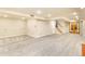 Open basement space with cozy carpets and staircase at 2700 S High St, Denver, CO 80210