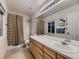Bathroom with double sinks, shower-tub combo and great lighting at 2010 Saddleback Dr, Castle Rock, CO 80104