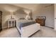 Calm bedroom with a vaulted ceiling, neutral tones, and plenty of storage space at 2010 Saddleback Dr, Castle Rock, CO 80104
