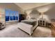 Calm bedroom with a vaulted ceiling, neutral tones, and a window view at 2010 Saddleback Dr, Castle Rock, CO 80104
