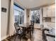 Dining room with large windows providing ample natural light and views at 2010 Saddleback Dr, Castle Rock, CO 80104