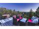 Outdoor patio area featuring comfortable seating and scenic views at 2010 Saddleback Dr, Castle Rock, CO 80104