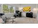 Functional home office with desk, comfortable seating, and ample natural light, ideal for working from home at 6803 Snowshoe Trl, Evergreen, CO 80439