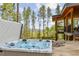 Relaxing hot tub with scenic mountain views, perfect for unwinding after a long day at 6803 Snowshoe Trl, Evergreen, CO 80439