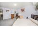 Comfortable bedroom with neutral decor, work space and ample natural light creating a serene retreat at 1223 Race St # 402, Denver, CO 80206