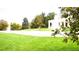 Enjoy this building's park-like grounds with lush grass, trees, and a fountain for the residents at 1223 Race St # 402, Denver, CO 80206