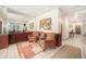 Inviting lobby featuring comfortable seating, a large mirror, artwork, and stylish decor at 1223 Race St # 402, Denver, CO 80206
