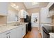 Bright kitchen featuring granite countertops and black appliances at 4694 S Fraser Ct # A, Aurora, CO 80015