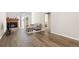 Cozy living room with a fireplace and stylish hardwood floors at 4694 S Fraser Ct # A, Aurora, CO 80015