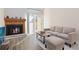Comfortable living room area with a fireplace and bright light at 4694 S Fraser Ct # A, Aurora, CO 80015