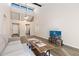Bright living room with vaulted ceilings and modern flooring at 4694 S Fraser Ct # A, Aurora, CO 80015
