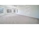 Spacious bedroom features neutral carpet, multiple windows offering natural light, and ample space at 5191 S Hannibal Way, Centennial, CO 80015