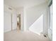 A bright room featuring carpeted floors, a window for natural light, and a closet for storage at 5191 S Hannibal Way, Centennial, CO 80015