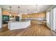 Well-equipped kitchen with stainless steel appliances, granite countertops and a central island at 5191 S Hannibal Way, Centennial, CO 80015