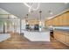 Open-concept kitchen with a large island, stainless steel appliances, and ample cabinet space at 5191 S Hannibal Way, Centennial, CO 80015