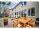 Outdoor patio featuring ample seating, a dining area, and seamless indoor-outdoor living at 5191 S Hannibal Way, Centennial, CO 80015