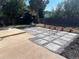 Backyard patio featuring a tiled surface and landscaping at 7586 Chase St, Arvada, CO 80003