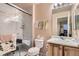 Bathroom featuring a glass-enclosed shower, vanity with sink, and neutral wall color at 12835 Mayfair Way # C, Englewood, CO 80112