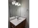Bathroom with vanity, large mirror and decorative lighting at 20000 E Mitchell Pl # 35, Denver, CO 80249