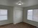 Bedroom features carpeted flooring, a standard closet, and windows that provide natural light into the room at 20000 E Mitchell Pl # 35, Denver, CO 80249