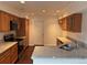 Well-lit kitchen boasts granite countertops and stainless steel appliances at 20000 E Mitchell Pl # 35, Denver, CO 80249