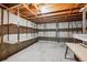 Spacious unfinished basement area featuring exposed ceiling and open shelving at 209 S 13Th Ave, Brighton, CO 80601