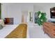 Serene primary bedroom with a walk-in closet, ensuite bathroom, and plenty of natural light at 902 Grove Dr, Louisville, CO 80027