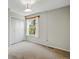 Bedroom featuring carpet and a window with natural light at 10311 E Evans Ave # 133, Aurora, CO 80247