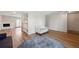 Open-concept living room with wood floors and an open layout at 10311 E Evans Ave # 133, Aurora, CO 80247