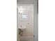 Well-lit powder room featuring a pedestal sink and classic design with great natural light at 1429 Josephine St, Denver, CO 80206