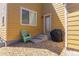 Pebbled backyard area with outdoor seating and a barbecue grill at 3793 Cadence Dr, Castle Rock, CO 80109